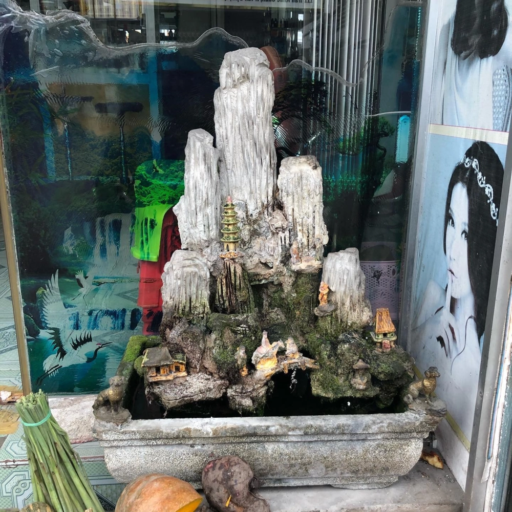 Mẫu hòn non bộ thác nước chuẩn phong thủy cho sân vườn